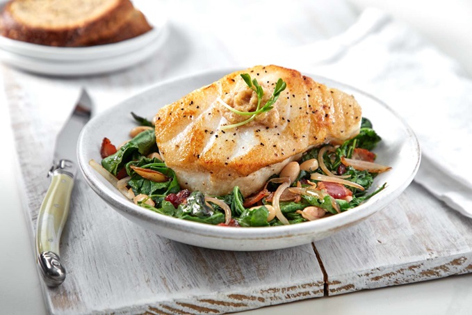 Bay Winds Chilean Sea Bass Filet Atop Greens
