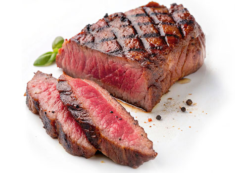 Juicy medium-rare steak sliced.