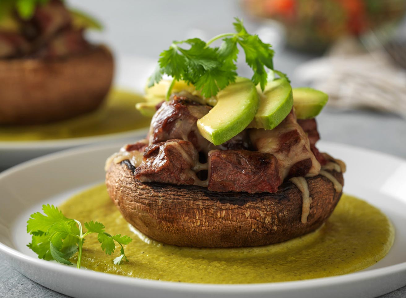 Steak-Stuffed Portobello with Poblano Sauce