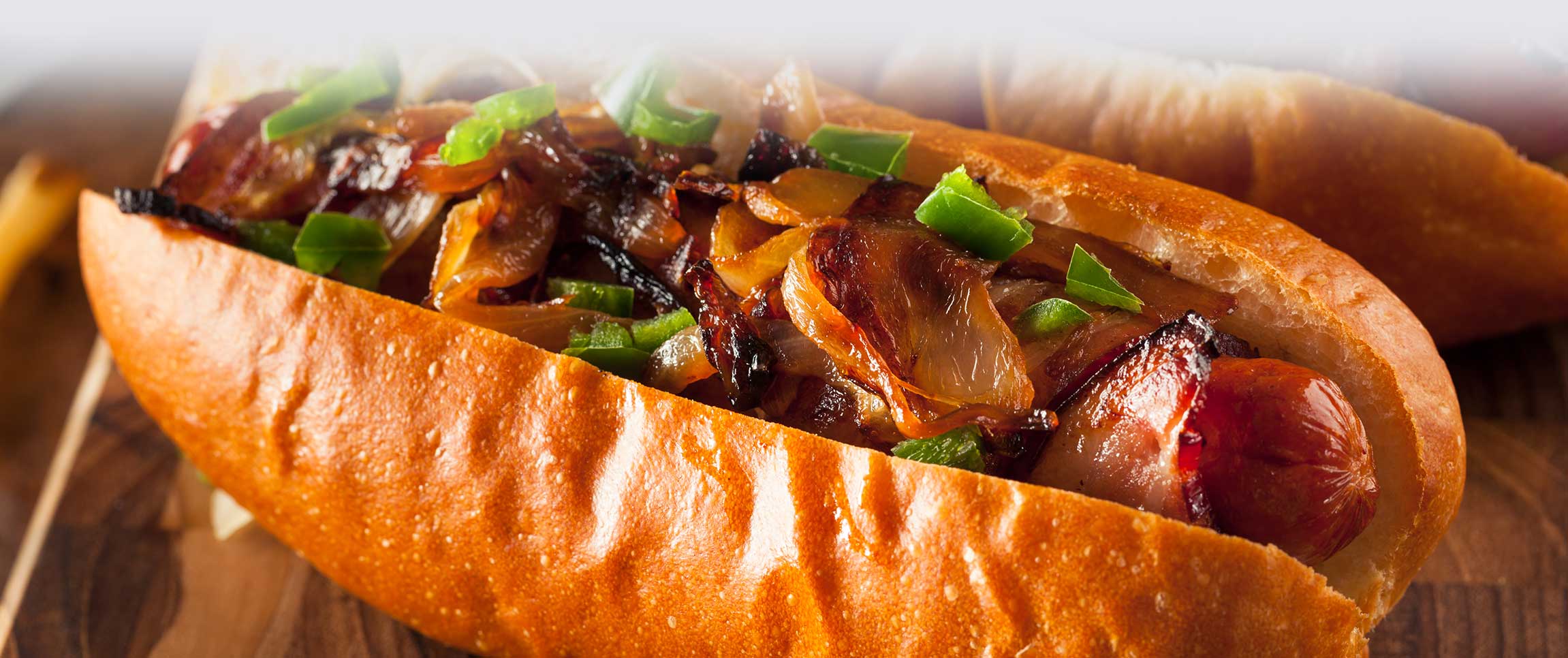 Bacon Dog with Stout Onions and Tabasco Ketchup