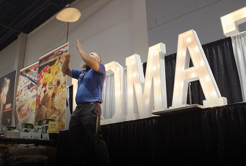 Man throwing pizza at the Tampa Show Competition